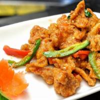 Crispy Chicken With Basil And Fresh Chili [Spicy] · Sliced boneless chicken breast marinated with Thai herbs, breaded and sauteed with chili sau...