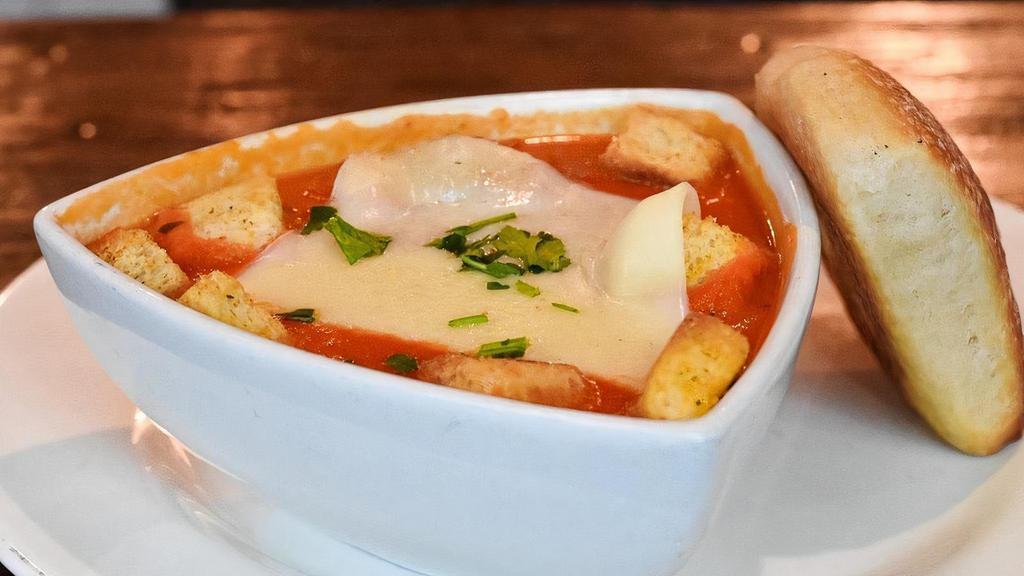 Roasted Tomato Bisque · Creamy Vegetarian Roasted Tomato Soup Finished w/ Cream Sherry, Served w/ Grilled Cheese Croutons