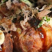 Takoyaki(6 Pcs) · Ball-shaped flour-based batter filled with diced octopus