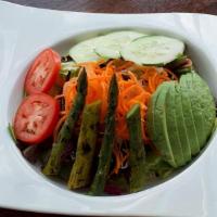 House Salad · Mixed greens, avocado, asparagus, cucumber, tomato, and ginger vinaigrette.