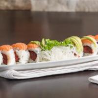 Dragon Roll · Spicy tuna inside, topped with salmon and avocado.