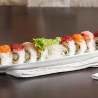 Tokyo Roll · Shrimp tempura inside, topped with spicy salmon, spicy tuna, spicy yellowtail, and sweet soy.
