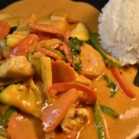 33 Red Curry · Spicy. (w/Rice) Coconut milk based, red chili curry with bell peppers, zucchini, carrots, ba...