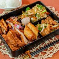 Ichi 2 Bento Special · Chicken teriyaki, chicken katsu, general Taos chicken, and stir fried veggies. Served with r...