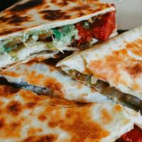 Super Quesadilla! · Cooked tortilla that is filled with cheese and folded in half.