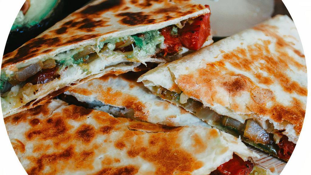 Super Quesadilla! · Cooked tortilla that is filled with cheese and folded in half.