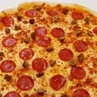 Pepperoni & Sausage · melted cheese, pepperoni, sausage,  perfectly delicious  crust! This pizza is everything tha...