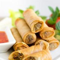Spring Rolls (4 Pcs) · Crispy rolls filled with shredded veggies served with sweet and sour sauce.