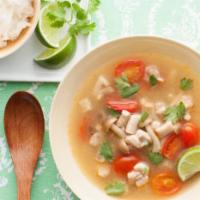 Thoum Yum Small · Spicy sour lemongrass soup with Shrimp or chicken and mushroom lime leave tomato and cilantr...