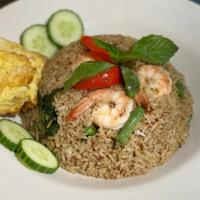 Green Curry Fried Rice · Medium spicy. Fried rice with green curry  sauce, onion, fresh basil leaves and fried egg.