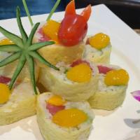 *Four Season Roll · Spicy. Tuna, real crab meat, avocado, mango, wrapped w/ soybean paper. Topped w. Mango sauce.