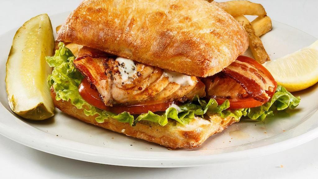 Gf Salmon† Blt Sandwich · Sweet and smoky salmon with bacon, lettuce, tomato, and lemon garlic aioli.