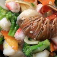 Cs13. Seafood Delight · Lobster meat, scallops, shrimp and crabmeat sautéed with veggies