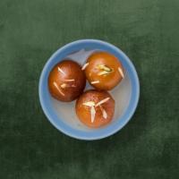 Gulab Jamun  · Soft delicious berry-sized treats made of milk solids, fried and steeped in a rich infused s...