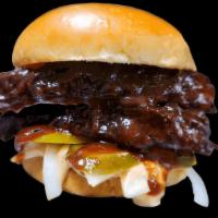 Ribless Bbq Sandwich · Tender rib slabs drowning in our house bbq sauce with pickles and onions