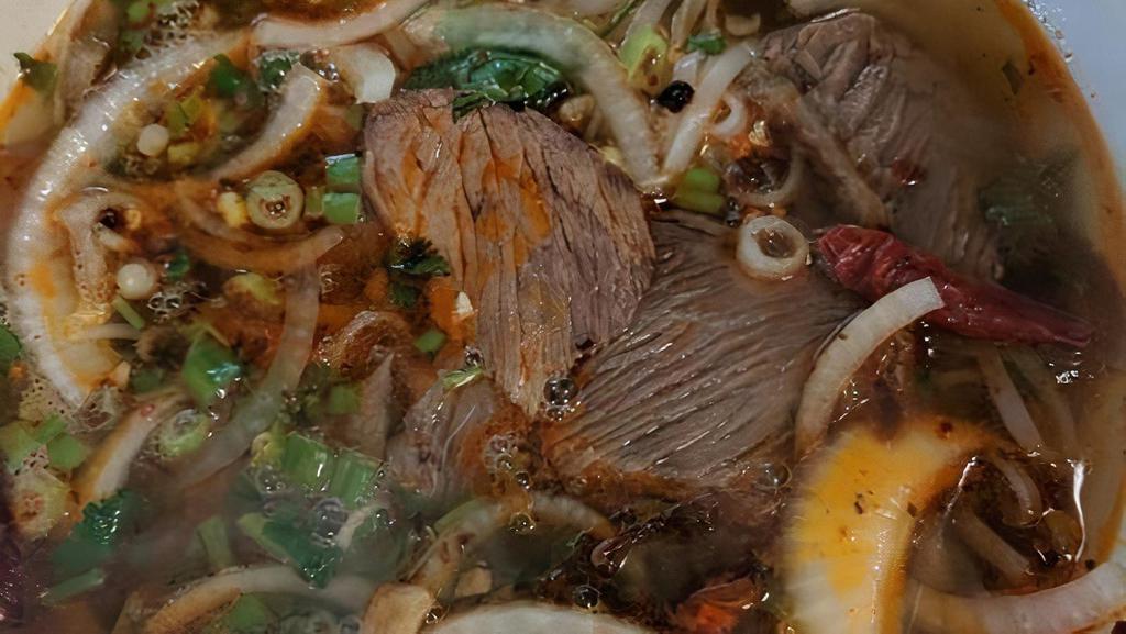 # 35 Spicy Beef · Spicy Beef Noodle  Soup