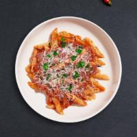 Marinara Pasta (Penne) · Fresh basil leaves, garlic, and grated parmesan cooked with penne.