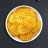 Waffle Fries · (Vegetarian) Idaho potatoes sliced in an alternating waffle pattern, fried until golden brow...