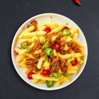 Chili Fries · Idaho potato fries cooked until golden brown and garnished with salt, and chili sauce.