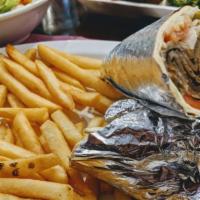 Gyro Sandwich · Seasoned and juicy stripes of mix beef and lamb wrapped in pita bread with lettuce, tomato, ...