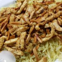 Chicken Shawarma Platter · Seasoned thinly sliced chicken breast strips with grilled onion and tomato served over basma...