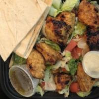 Chicken Kabob Platter · Two skewers of marinated grilled boneless chicken breast with grilled onion and tomato serve...