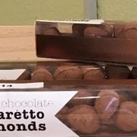 Amaretto Almonds · Organic almonds covered in organic, fair trade, vegan dark chocolate, soaked in almond lique...