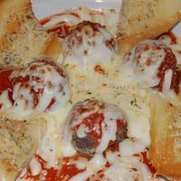 Papalis Meatballs · Housemade Meatballs topped with Marinara Sauce, Melted Mozzarella Cheese and served with Gar...