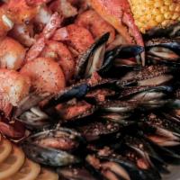 The Cajun Boil · 1/2 lb crawfish, 1/2 lb black mussels, 1/2 lb head-off shrimp.