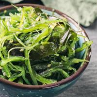 Seaweed Salad · Fresh seaweed, sesame oil, red chili pepper topped with sesame seeds.