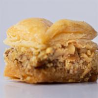 Walnut Baklava (By Pound) · Vegetarian. Special. Layered pastry dessert handmade from fresh filo dough, filled with chop...
