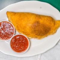 Calzones · Served with Mozzarella and ricotta cheese and your choice of one filling. Served with marina...