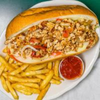 Chicken Steak & Cheese Subs · Chopped chicken grilled with sweet peppers, mushrooms, and onions with lettuce, tomatoes, an...