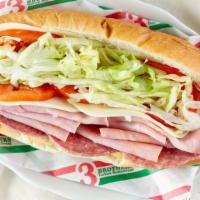 Italian Combination Sub · Ham, salami, capicola, provolone, lettuce, tomatoes, mayo, onion, hot peppers, and house Ita...