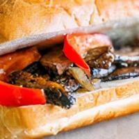 The Not So Cheesy Steak · Steak or chicken, grilled mushrooms, red and green peppers on a 6” toasted garlic hoagie roll