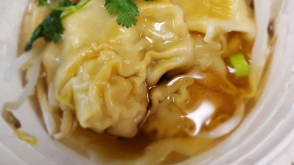 Wontons Soup · Chicken and shrimp stuffed wontons in a clear broth, Finished with bean sprouts, scallions and fried garlic.