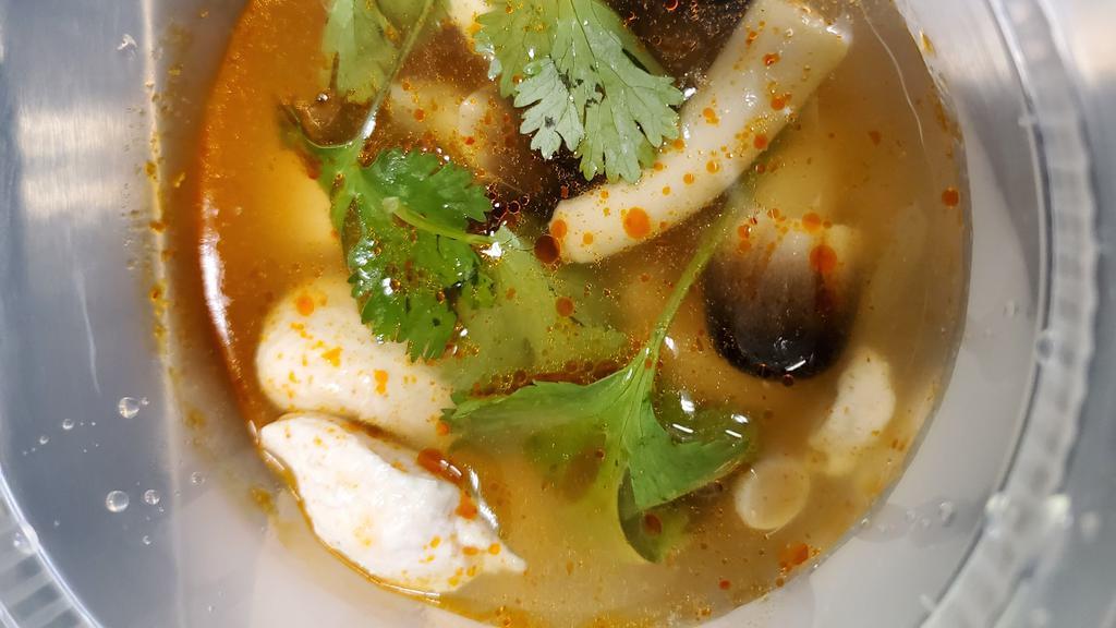 Tom Yum · Spicy. Exotic Thai sour and spicy lemongrass broth with mushroom tomatoes, and cilantro.