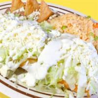 Flautas · 3 rolled-up tortillas filled with chicken. Served with rice, refried beans, fresco cheese, s...