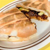 Torta Chipotle · Chipotle sandwich. Telera bread, stuffed with fajita or chicken on chipotle sauce, refried b...