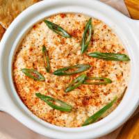 Baked Crab Dip · lump crab meat, scallions, white cheddar & parmesan served w flatbread crackers