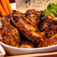 Stones Hot Wings · A pound of roasted, house seasoned wings tossed in Stone's Hot sauce served with bleu cheese...