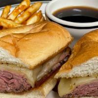 Balboa · Shaved roast beef and melted provolone on toasted garlic bread with au jus and crispy fries.