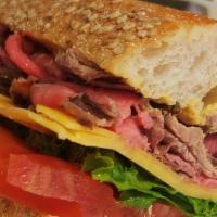 1 Scholar · Thinly sliced roast beef, cheddar cheese, lettuce, tomato and mayo