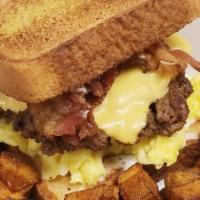 Breakfast Burger W/ Bacon · Patty, eggs, cheese, bacon, on TX Toast.