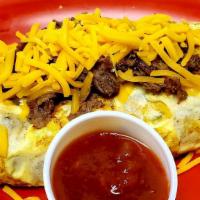 Big Steak Omelet · Philly steak, green peppers, onions, & cheddar cheese and a side.