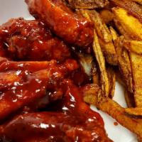Tossed Party Wings · 8 Wingettes/Drumettes tossed in your favorite flavor with fries
