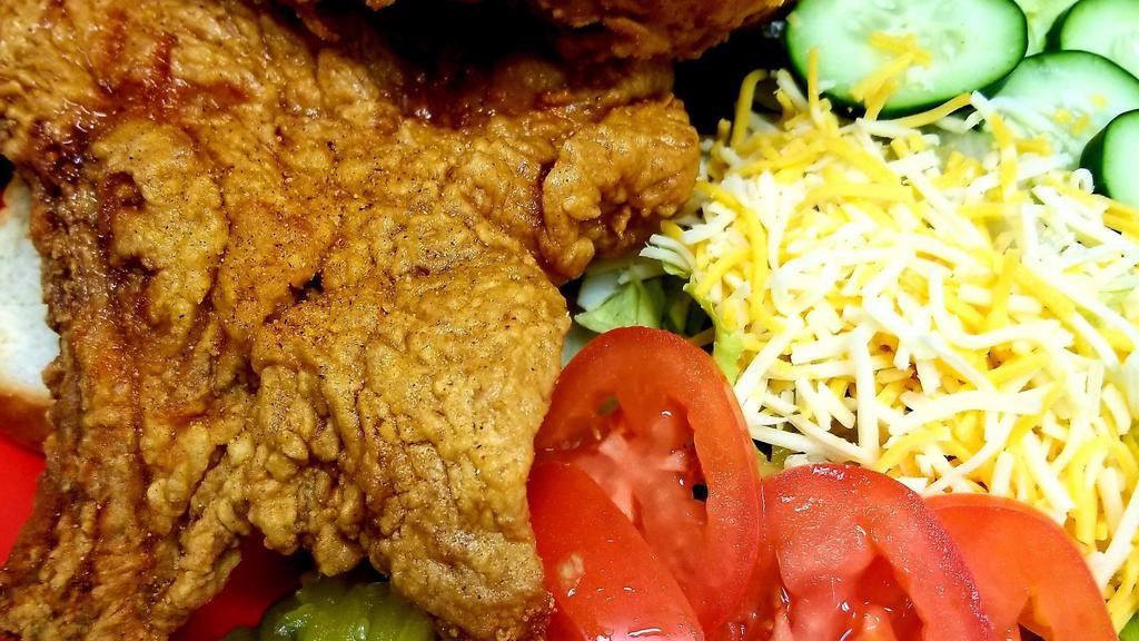 Pork Chops R Us Basket With Side Salad · Two Pork chops, bread, pickles, jalapeños, side salad comes with chopped pickles, cucumbers, tomatoes, and cheese.