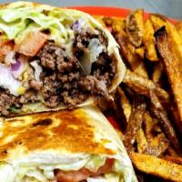 Burger Wrap · Ground meat stuffed in a tortilla with ranch, lettuce, tomatoes, pickles, onions.