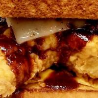 Bbq Chicken Melt · 2 tenders, Swish, and American cheese, sauteed onions, bbq sauce on TX Toast .