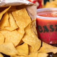 👨‍👩‍👧‍👦 Family-Size Chips & Salsa 16Oz · 16 ounces of our house salsa with a large bag of chips.